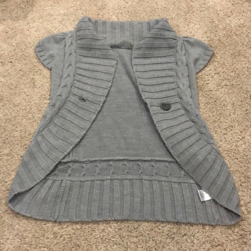 A grey cardigan